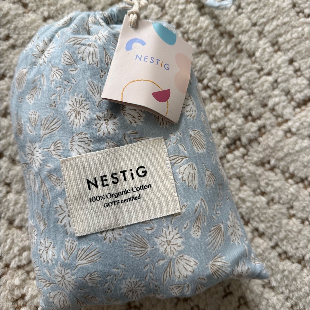 Nestig nwt pack of two mini crib sheets